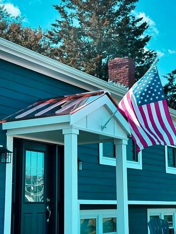 Copper roof over a front entry