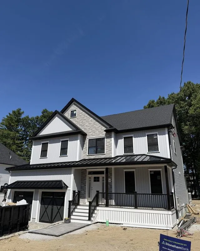 New home with a standing seam porch roof