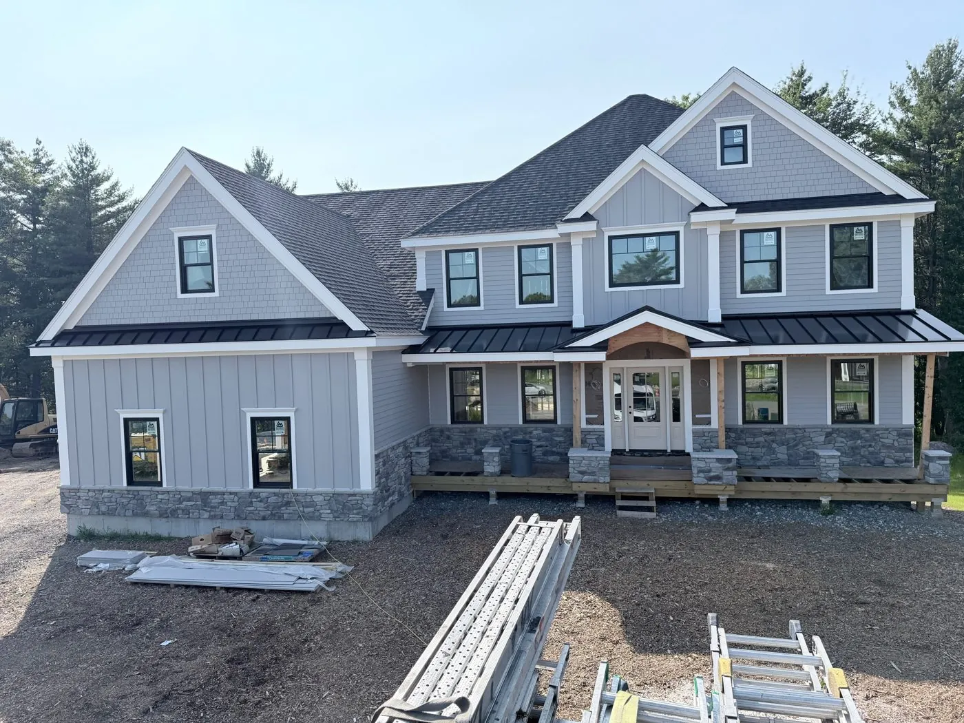 Two-story home with a new standing seam metal roof